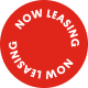 a red circle with the words 'Now Leasing'