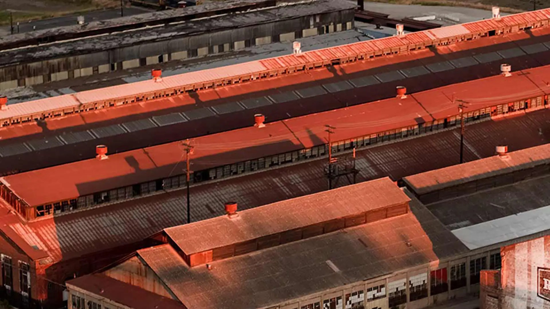 an aerial photo of the red rooftops at the trainyard