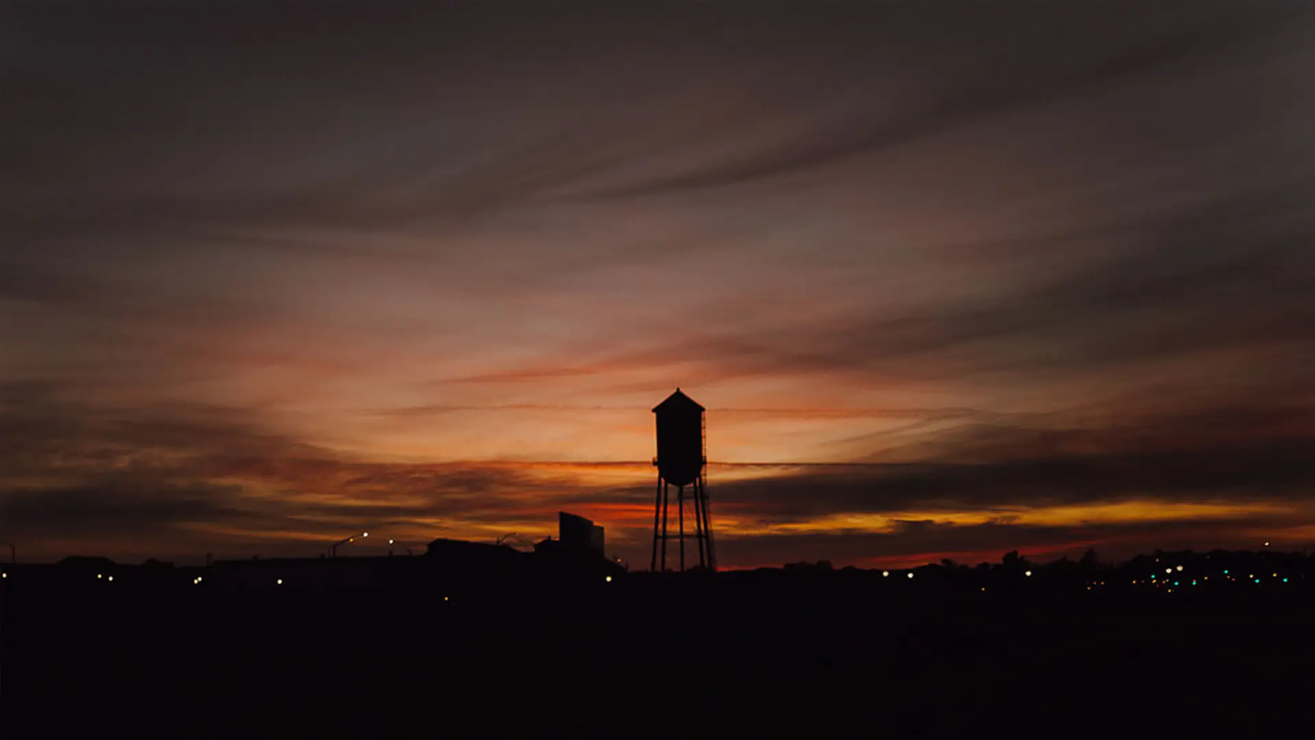 a photo of the Railyards water tower at dusk