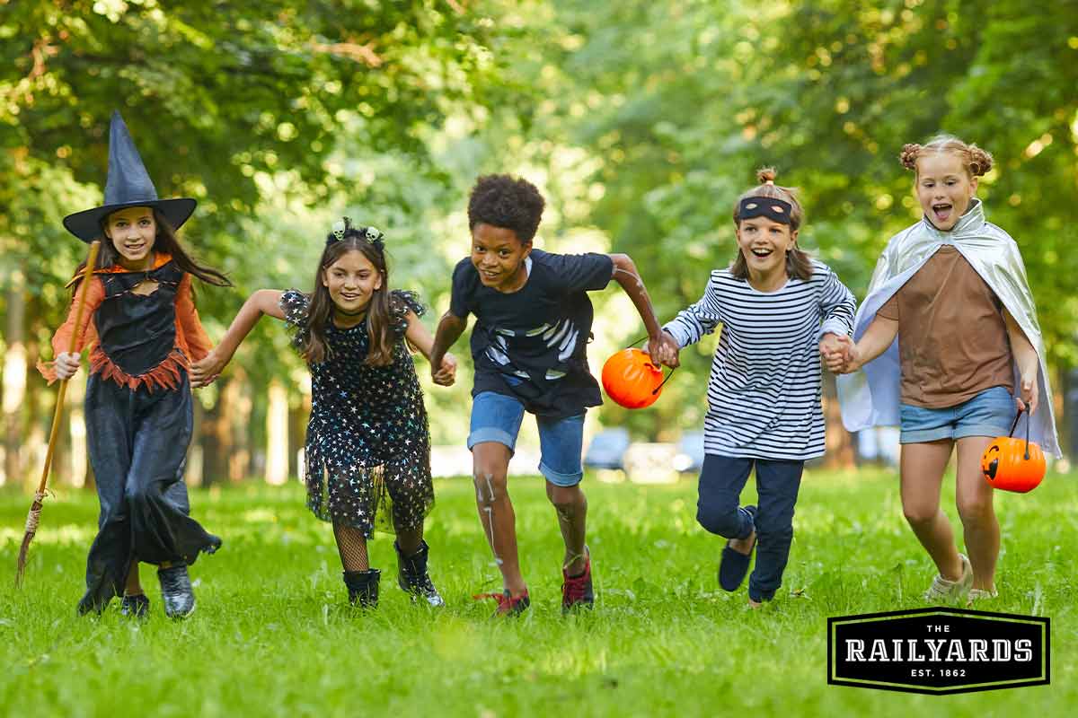 Costumed kids celebrate Halloween outside. Discover 5 Sacramento family-friendly events.