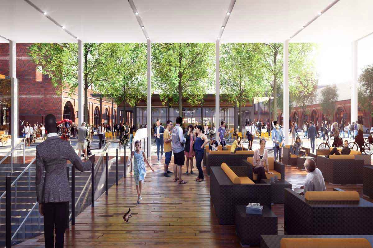 Early concept art of the Railyards featuring crowds of people, outdoor seating, and brick buildings.