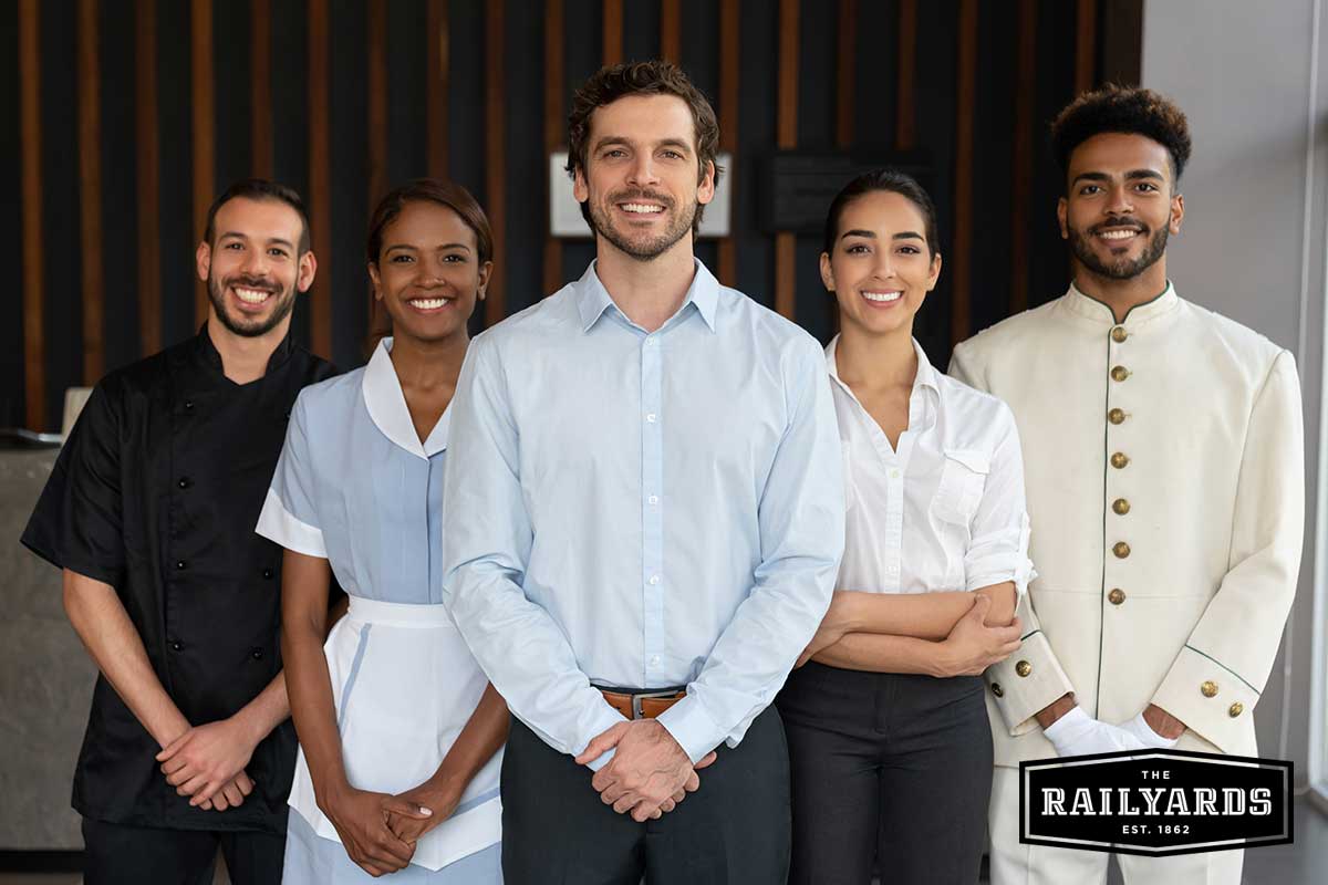 Hotel employees smile facing the camera. Learn more about how the Paycheck Protection Program is bringing relief to Sac.