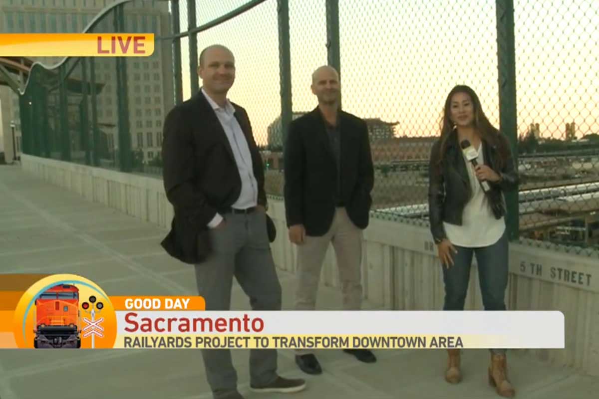 Screen grab of Nha Ngyuen with Denton Kelly and Alan Hersch on the 5th Street Bridge in Sacramento.