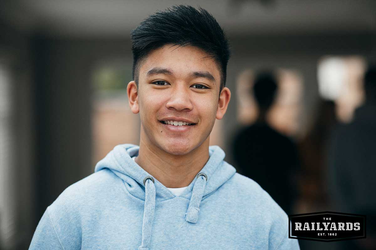 Image of a young man smiling at the camera. Sacramento puts youth to work to mitigate COVID-19's impact.