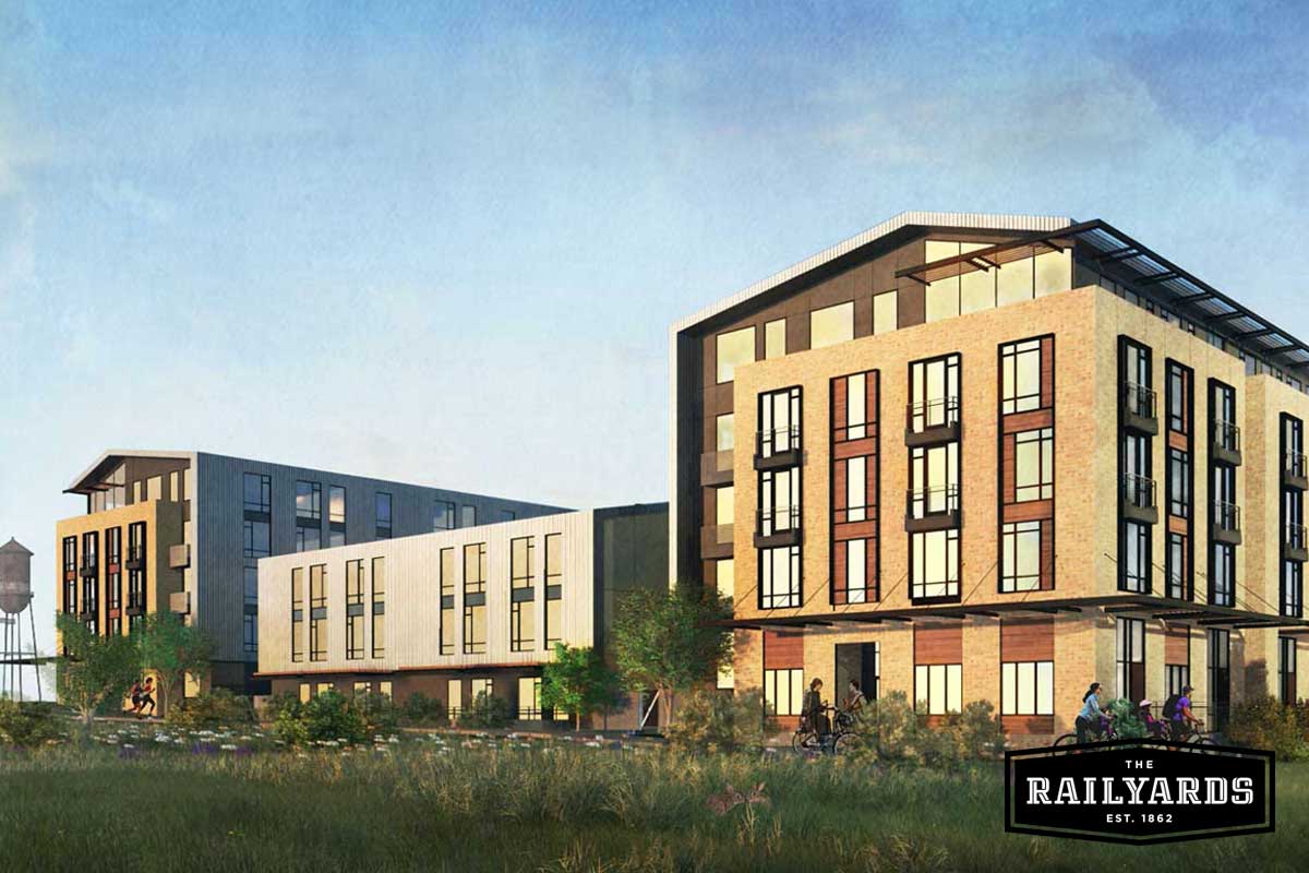 Image features a woman commuting via bicycle. Learn more about sustainable infill developments like the Railyards.